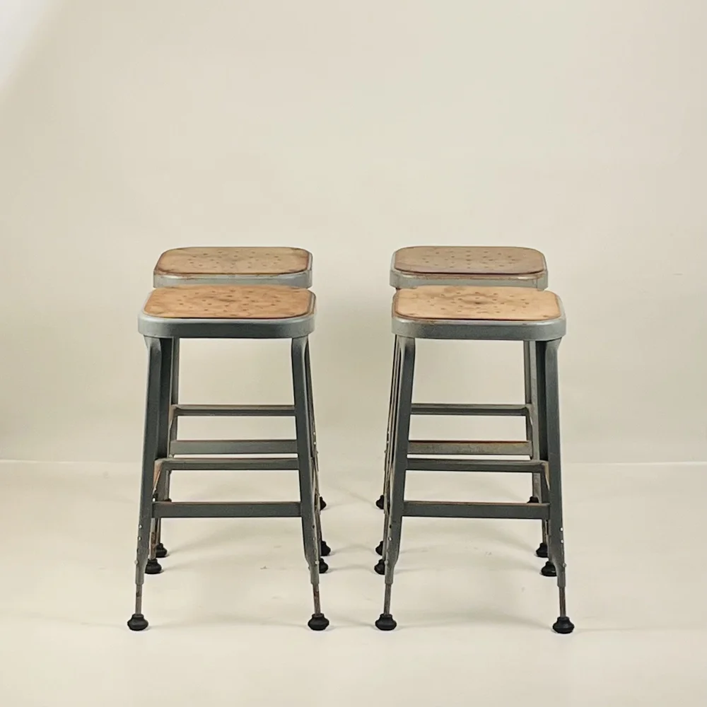 Set of 4 Adjustable Patinated Steel Counter Stools by Lyon